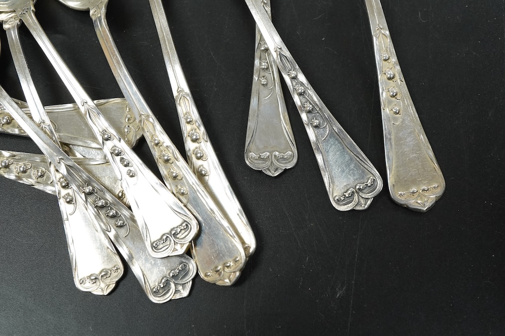 A set of eleven continental Art Nouveau .800 silver teaspoons length 14.8 cm., weight approx. 6.98ozt